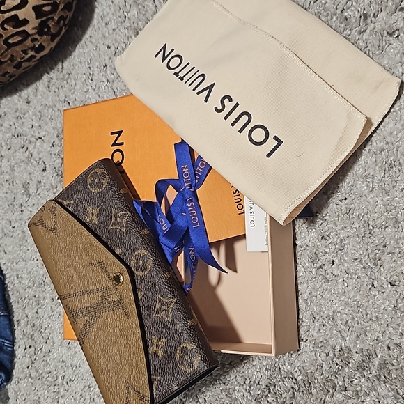 Authentic Louis Vuitton Sara wallet. - Picture 8 of 10